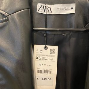 Black leather trench coat